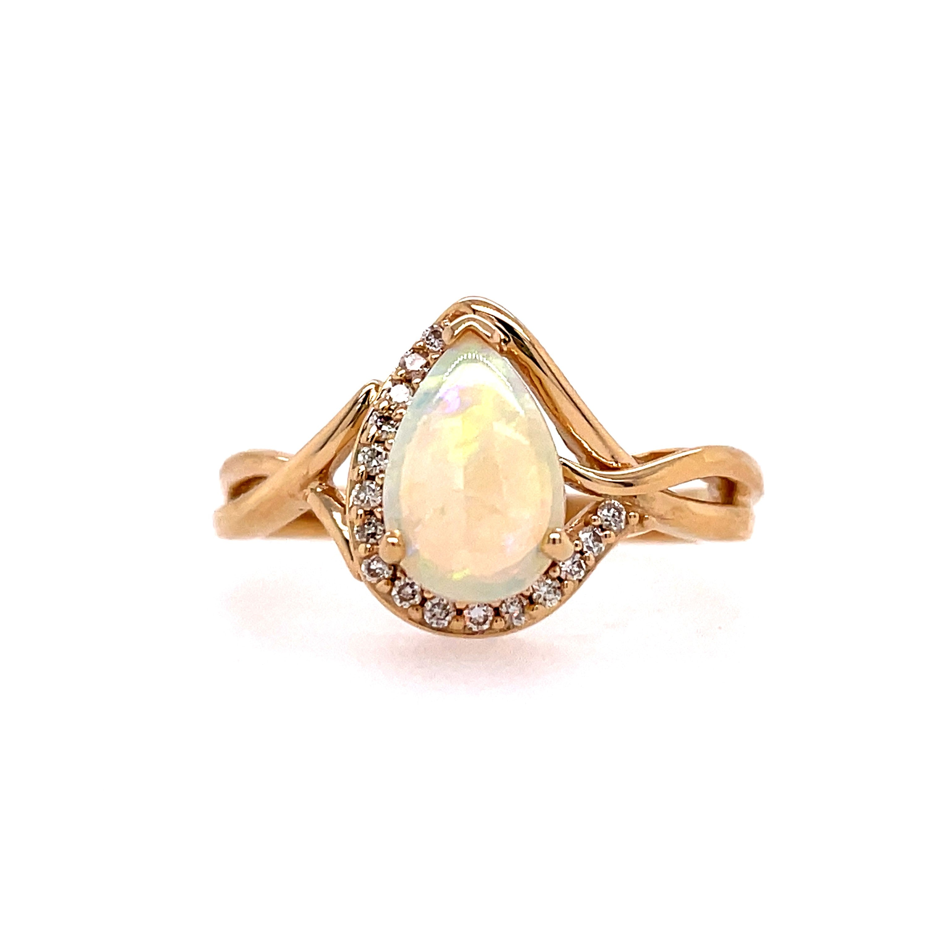 Lady's Yellow 14 Karat Melody Fashion Ring With One 0.70Ct Pear Opal And 16=0.10Tw Round H/I Si2 Diamonds, Regularly $1600.00 Vendor Price $800.00

Purchases made from our Vendor Price case are not eligible for "complimentary" services. Standard ring si