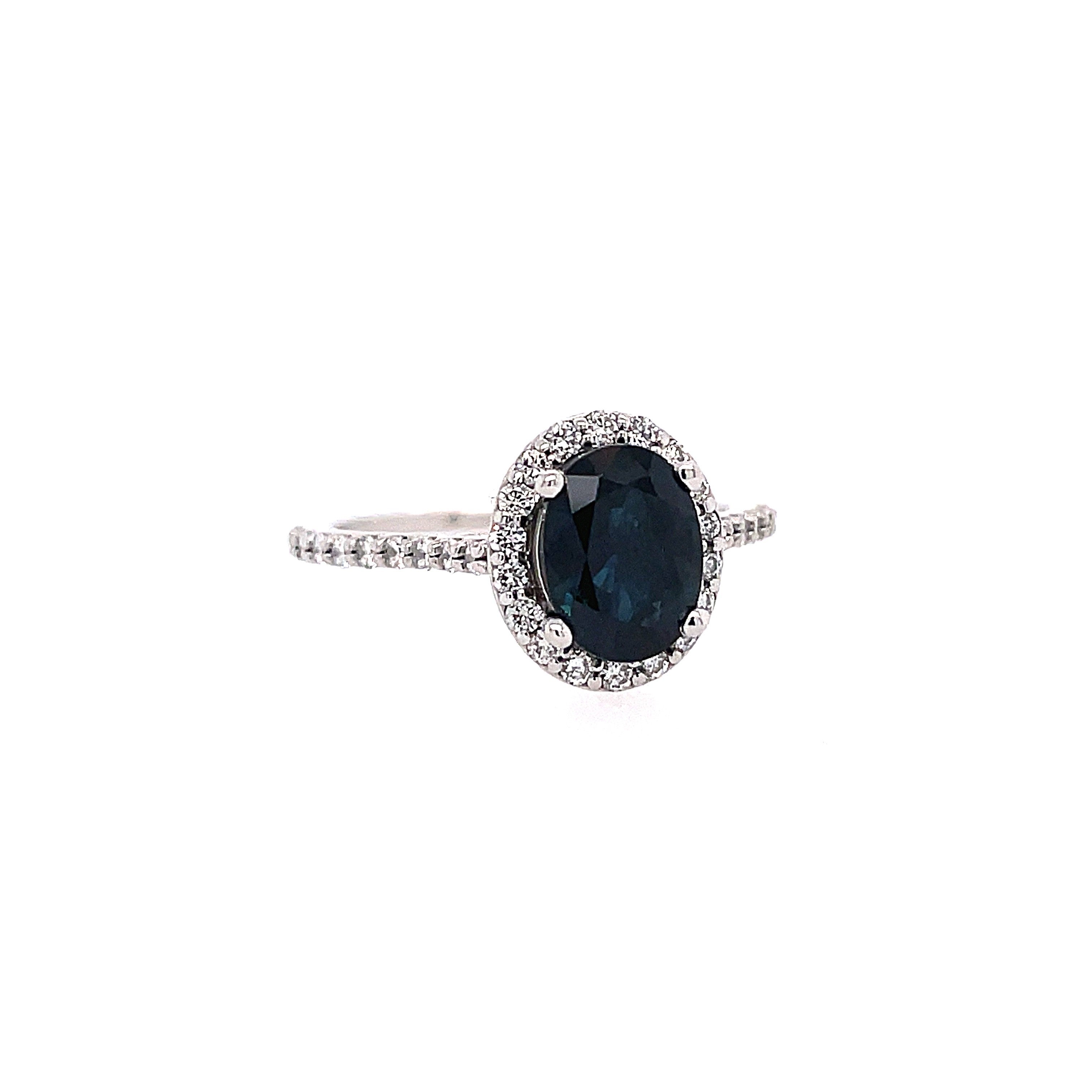 Lady's White 14 Karat Cathedral With Oval Halo Fashion Ring Size 6.25 With One 1.68Ct Oval Sapphire And 0.44Tw Round G/H Si1 Diamonds