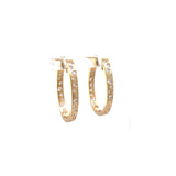 Lady's Yellow Satin 14 Karat Oval Hoops With Flush Set Earrings With 0.63Tw Round G/H Si1 Diamonds