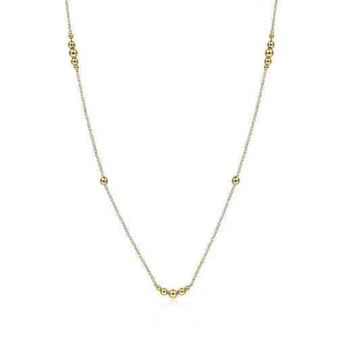 Yellow 14 Karat Graduating Bead Station, Bujukan Collection Chain Length 28