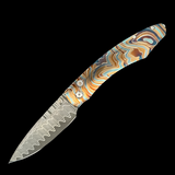 "B12 Topo" William Henry Knife with 'Wave' Damascus Steel Pattern Blade and Color Laser-engraved Titanium Frame.