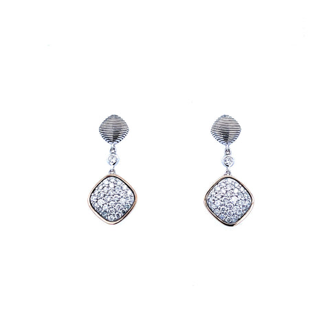 Lady's Tt 18K/Ss Dangle Pave' Earrings With 0.76Tw Round G/H Si1 Diamonds Regularly $2400 Vendor Price $1200

Purchases made from our Vendor Price case are not eligible for "complimentary" services. Standard ring sizings, setting fees, and yearly rhodiu