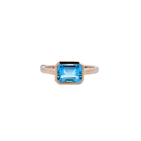 Lady's Yellow 14 Karat Bezel Fashion Ring With One 1.88Ct Emerald Blue Topaz