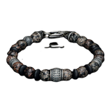 William Henry Beaded Bracelet features three custom sterling silver beads, sterling end caps, and lobster clasp.