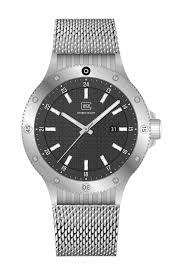 Timeless design meets technical precision in this refined timepiece. The silver-tone stainless steel case encases a black dial distinguished by GLOCK’s signature RTF structure, creating a subtle yet powerful contrast. Silver-tone hands and indices with
