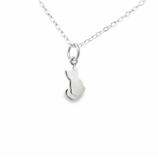 A very dainty cat cut out created in sterling silver hung on an 18in sterling silver dainty chain.