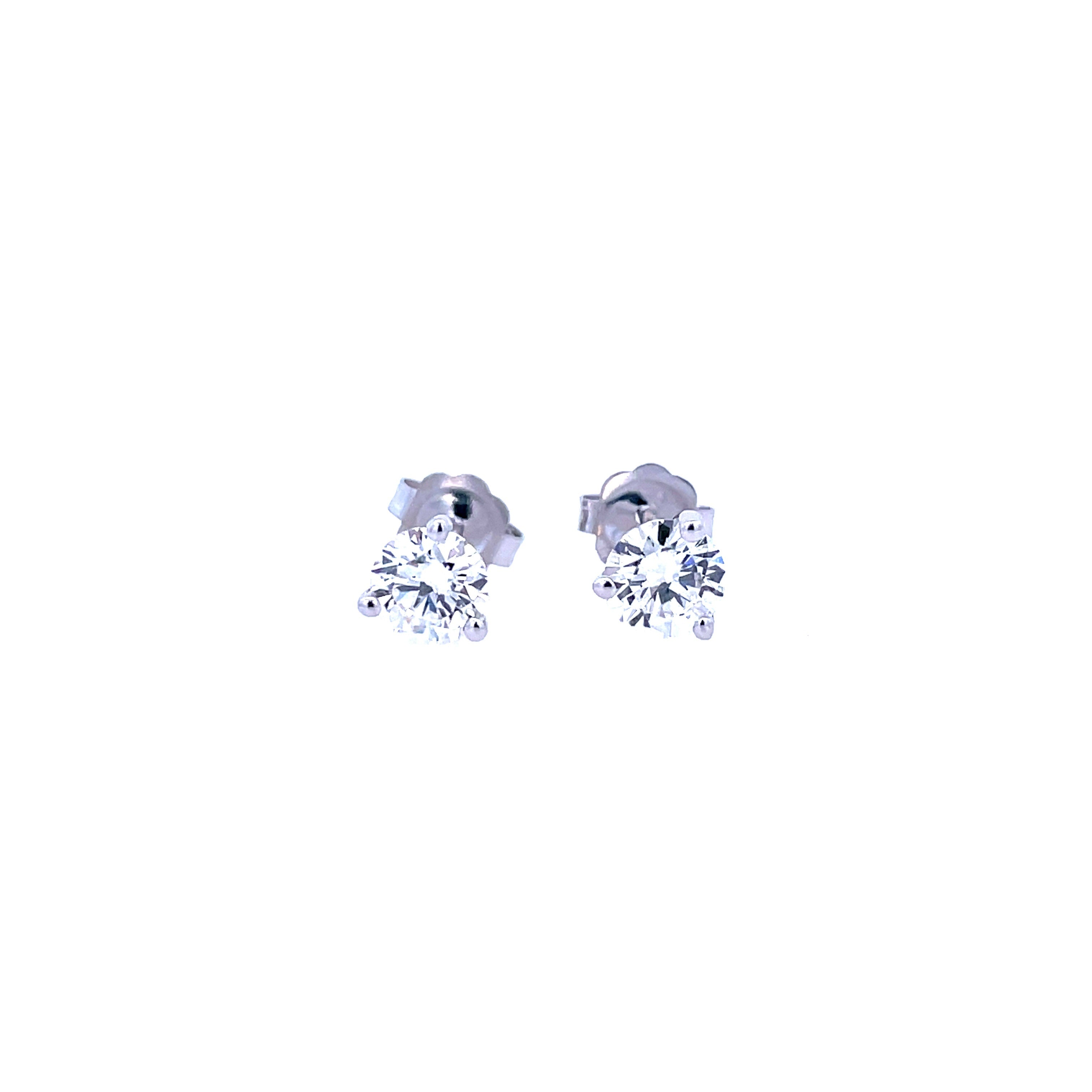 Lady's White 14 Karat Three Prong Martini Earrings With 2=0.75Tw Round