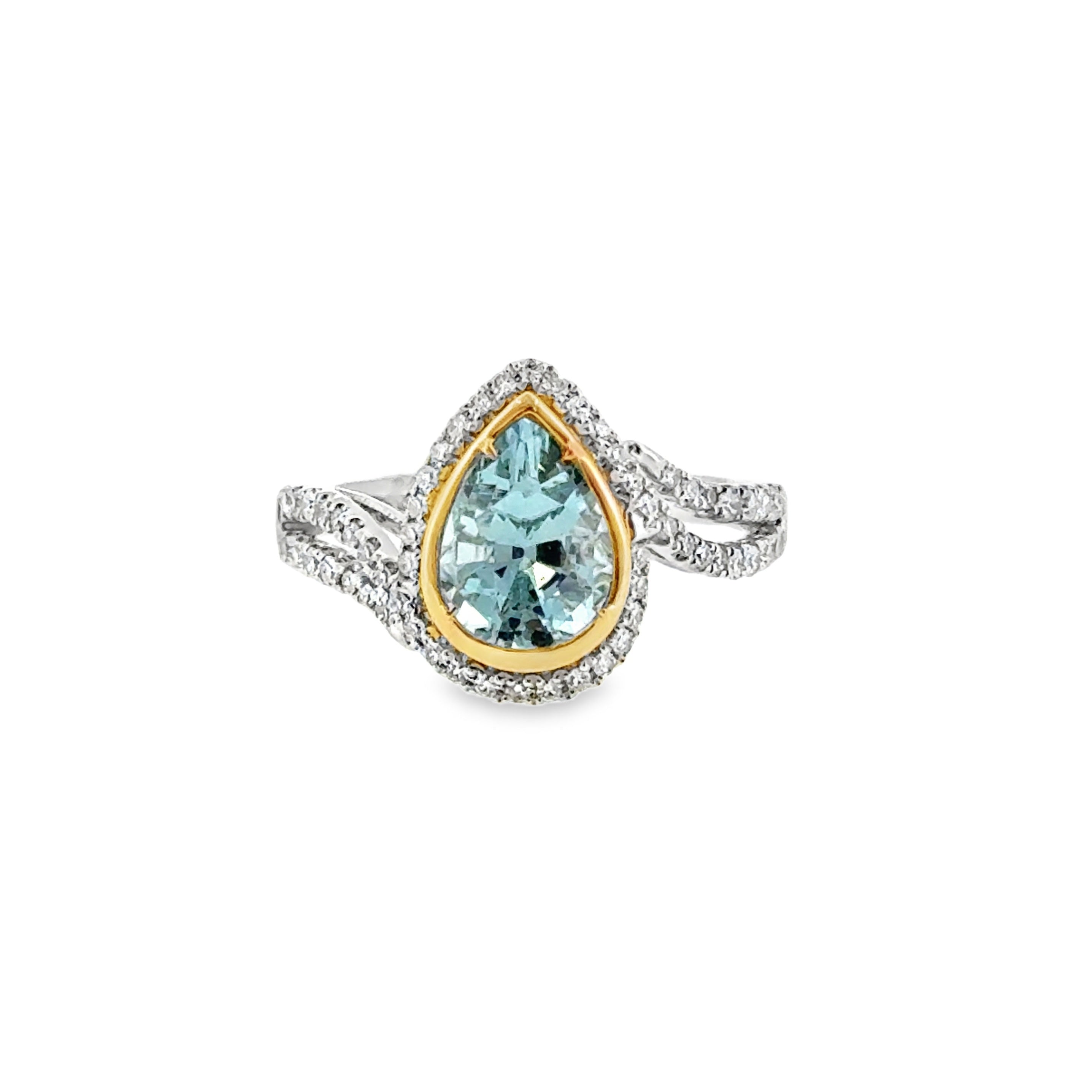 14 Karat White and Yellow Gold Halo Fashion Ring with 1.36ct Aquamarine and .31ctw Round Diamonds