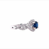 Lady's White 14 Karat Twist With Round Halo Fashion Ring Size 6.5 With One 0.85Ct Round Sapphire And 0.60Tw Round H/I Si2 Diamonds