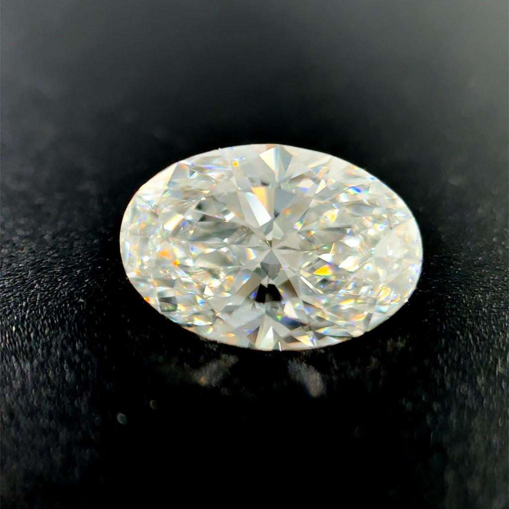 Lab Created one = 1.58ct Oval D VVS1 Lab Created Diamond