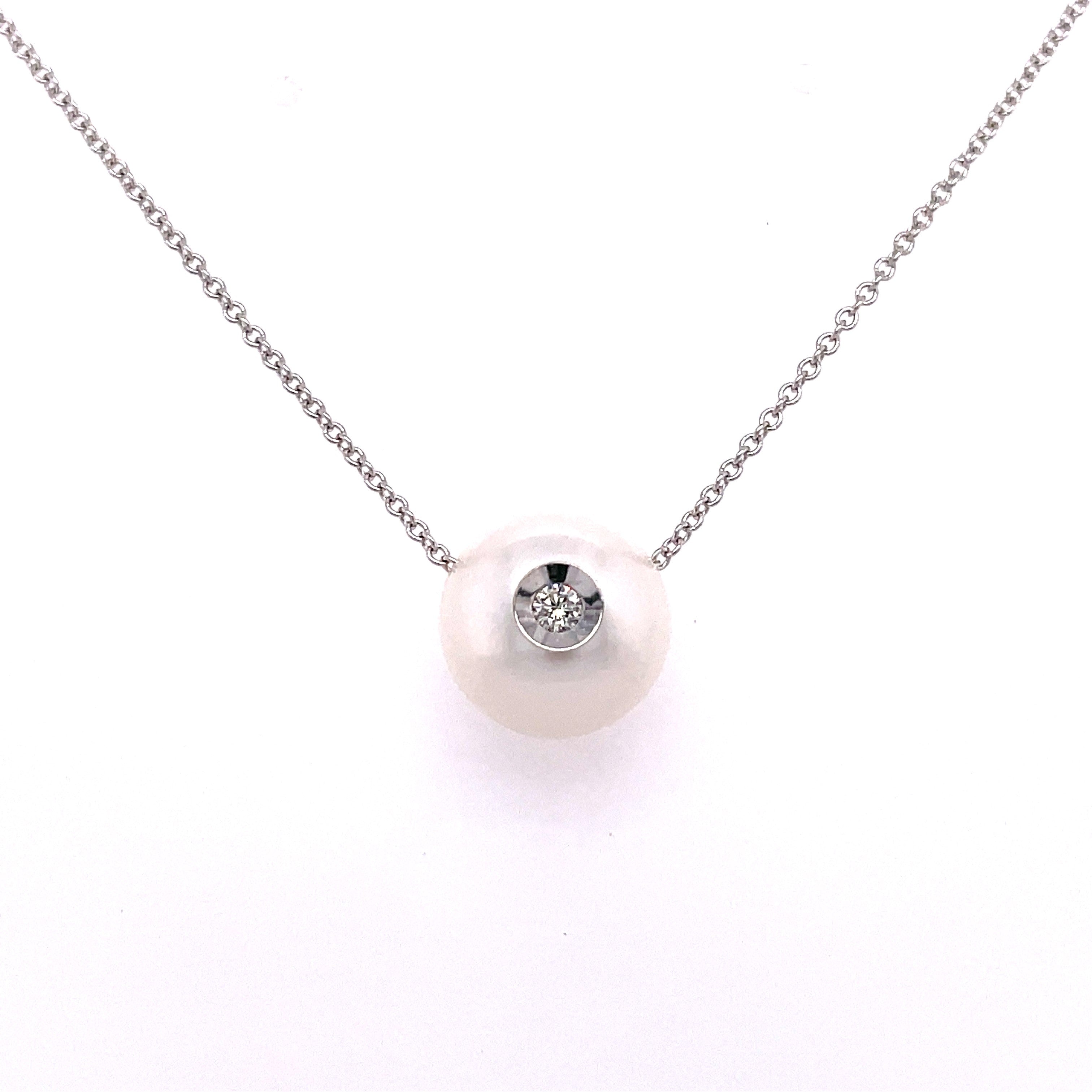 Lady's White 14 Karat Smooth Dia In A Pearl Necklace = Fresh Water White Pearls
one = 0.04ct Round G/H SI1 Diamond