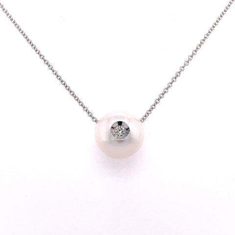 Lady's White 14 Karat Smooth Dia In A Pearl Necklace = Fresh Water White Pearls
one = 0.04ct Round G/H SI1 Diamond
