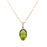Lady's Yellow 14 Karat Partial Halo, With Oval Link Chain Necklace Length 18 one = 3.13ct Oval Peridot
13 = 0.06tw Round G/H SI1 Diamonds