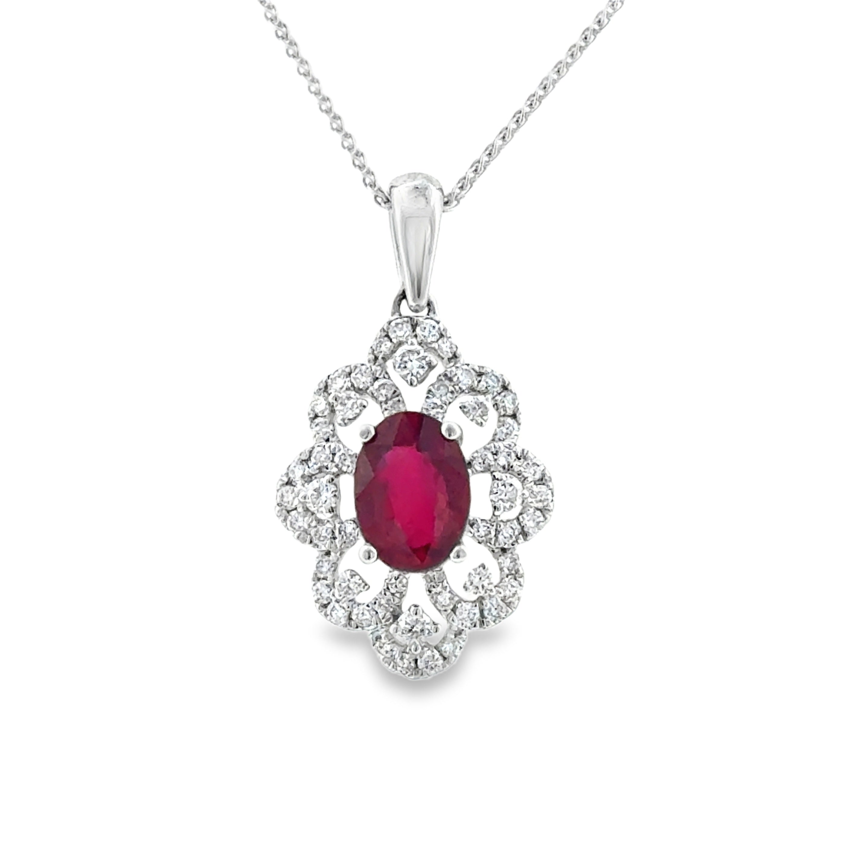 14 Karat White Gold Vintage Fashion Pendant with .95ctw Oval Ruby and .25ctw Round Diamonds