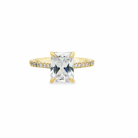 14 Karat Yellow Gold Engagement Ring Set with One Radiant Cubic Zirconium and .33ctw Round Brilliant Cut Diamonds.