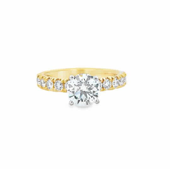 14 Karat Yellow Gold Engagement Ring with 7.5mm Round Cubic Zirconium, and .75ctw Round Brilliant Cut Diamonds