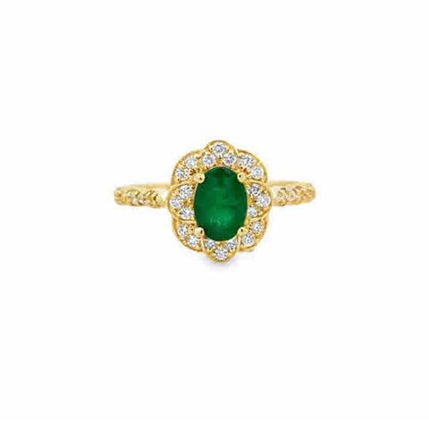 14 Karat Yellow Gold Vintage Inspired Ring with an Oval Cut Emerald, and Round Brilliant Cut Diamonds