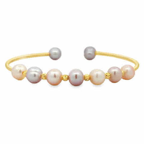 This chic bracelet is made of 7mm freshwater pink and peach pearls. The metal is yellow gold over copper