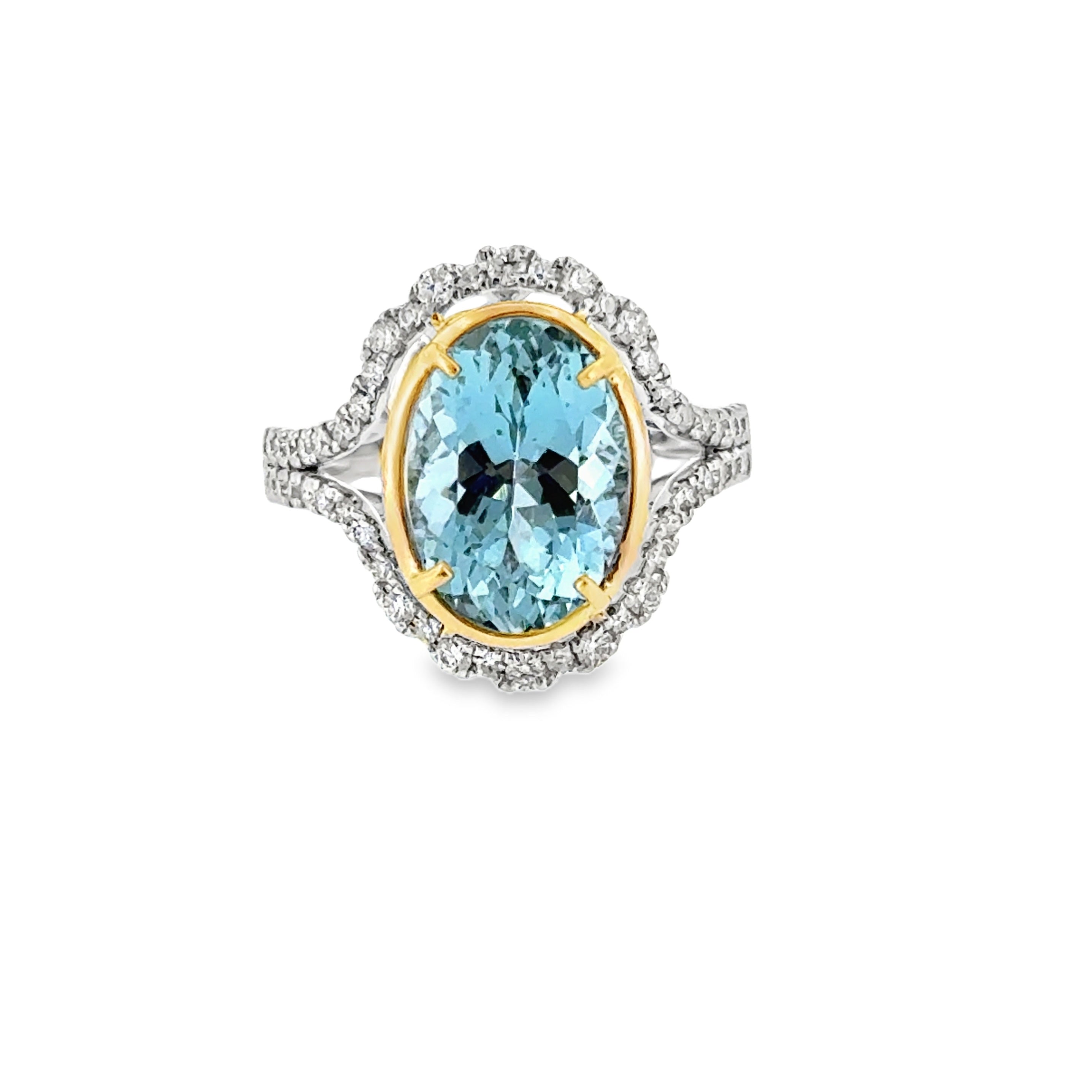 Platinum and 14 Karat Yellow Gold Halo Fashion Ring with 4.51ct Aquamarine and .58ctw Diamonds