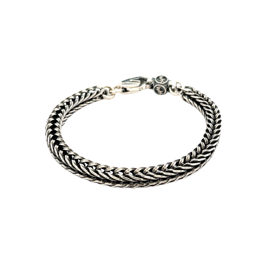 Bold, supple, fluid, snakelike, this foxtail chain bracelet  in sterli