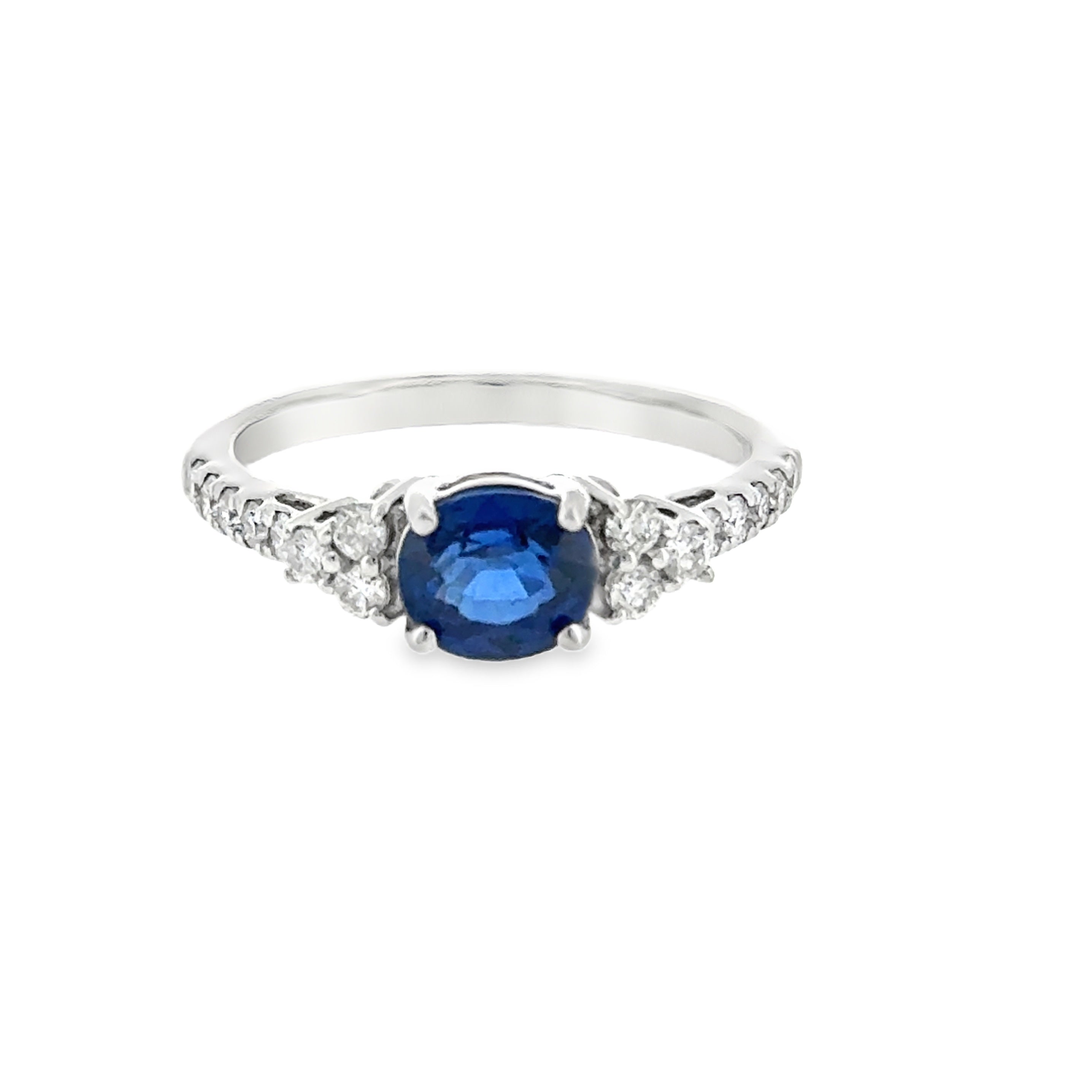 14 Karat White Gold Fashion Ring with 1.18ctw Oval Cut Sapphire and .33ctw Round Brilliant Cut Diamonds