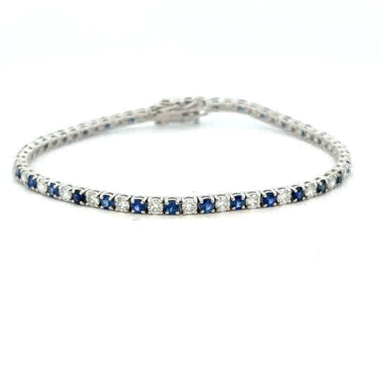 18 Karat White Gold,  Tennis Style Fashion Bracelet, 2.55ctw Round Brilliant Cut Diamonds, and 3.10ctw Round Sapphires