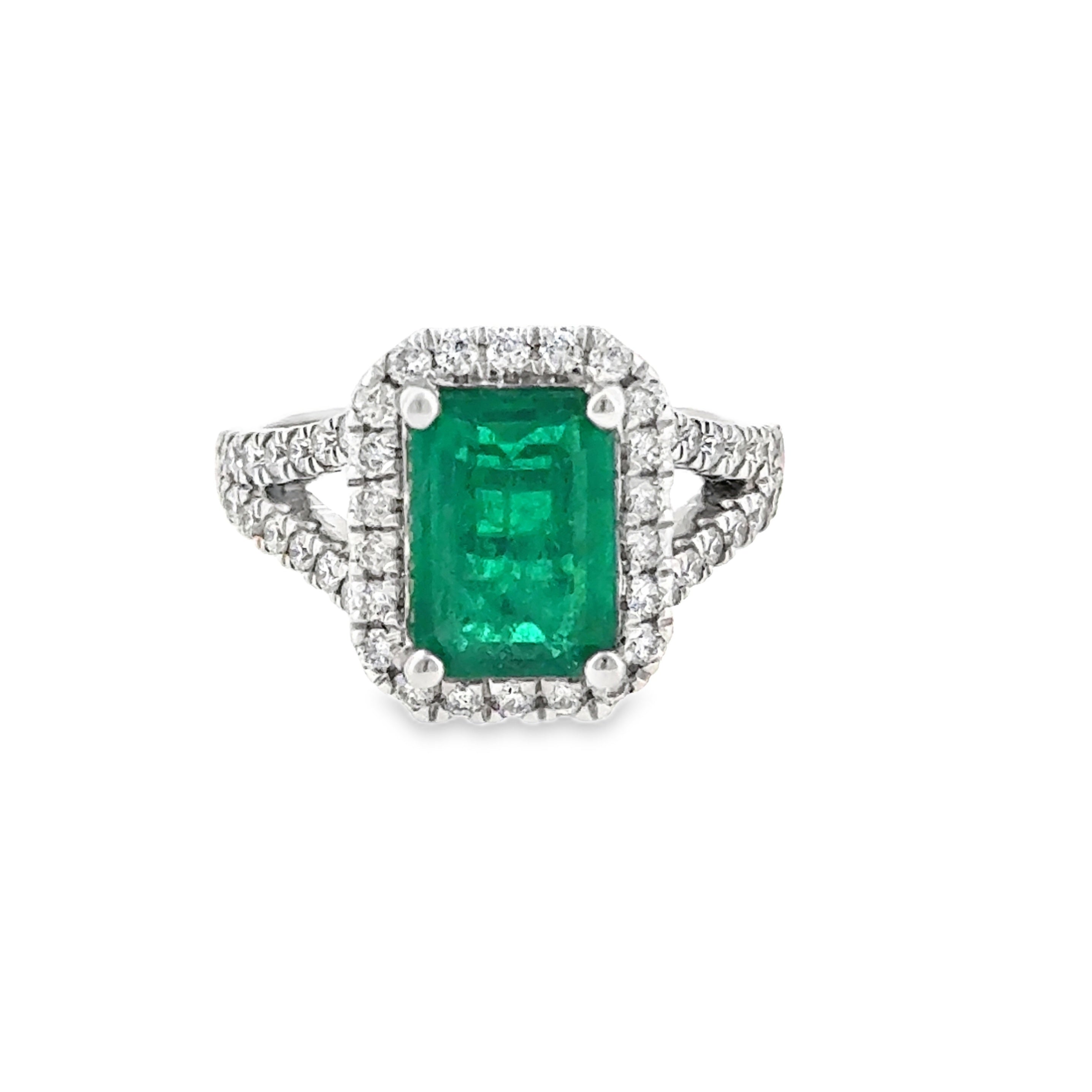 14 Karat White Gold Split Shank Halo Fashion Ring 2.37ctw Emerald and .62ctw Round Brilliant Cut Diamonds