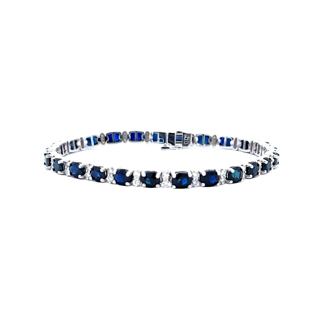 "Elegance Unveiled: Lady's White 14 Karat Oval Link Bracelet with Sapphires and Diamonds"