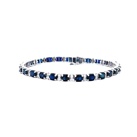 "Elegance Unveiled: Lady's White 14 Karat Oval Link Bracelet with Sapphires and Diamonds"