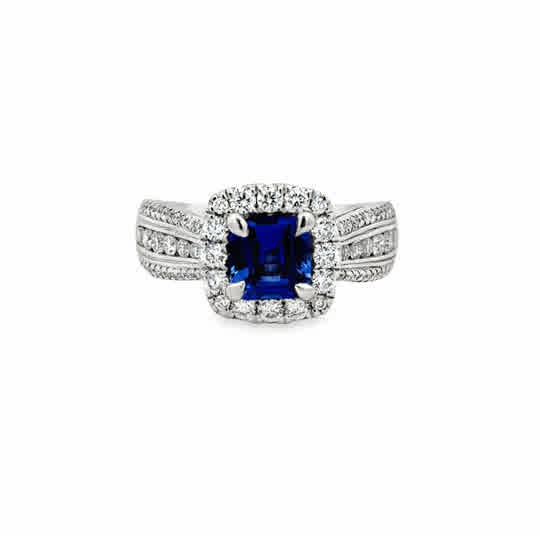 18 Karat White Gold Double Halo Fashion Ring with 1.28ct Sapphire and .82ctw Round Brilliant Cut Diamonds