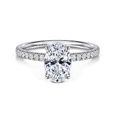 White 14 Karat Prong Set Ring Size 6.5 one 11.00x7.20mm Oval Cubic Zir