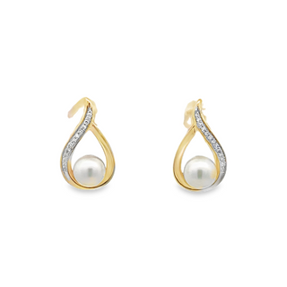 Lady's Yellow 14 Karat Swirl Earrings 2 Fresh Water Pearls
0.05tw Rou
