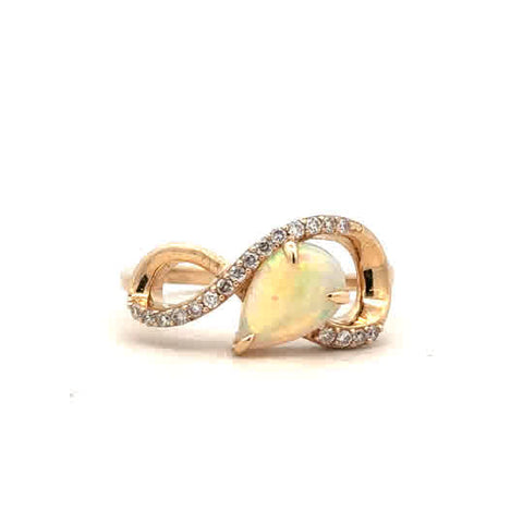 Lady's Yellow 14 Karat Fashion Ring With One 0.70Ct Pear Opal And 0.13