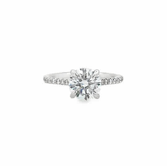 Elegant Hidden Halo ring in 14K White Gold.