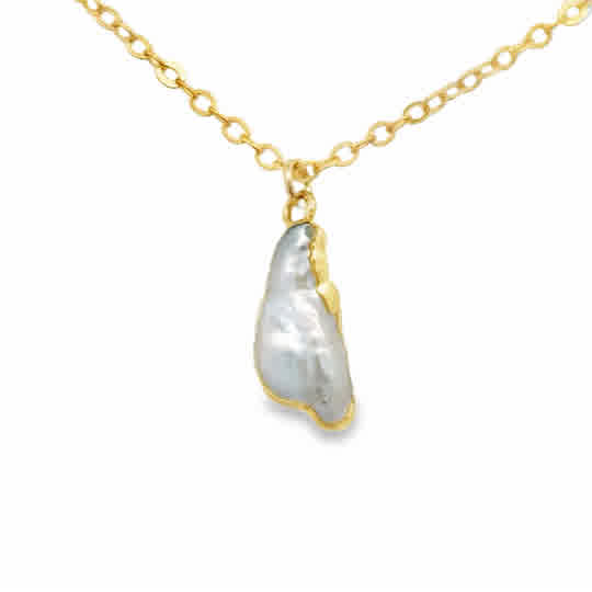 An irregular pearl with gold-plated silver around the edges hung on an 18″ gold-filled dainty chain.