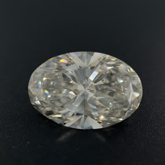 Lab Created one = 4.86ct Oval J VS2 Lab Created Diamond