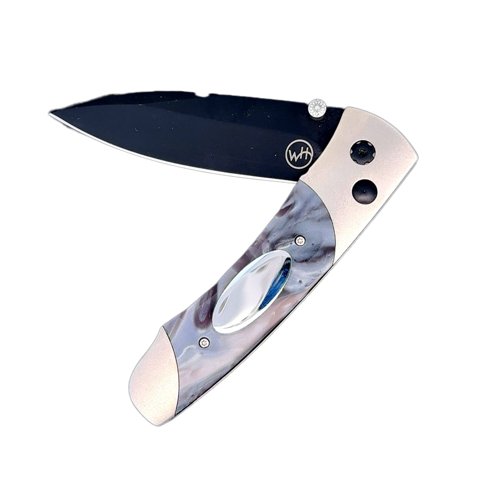 William Henry Knife A200 expands on our tradition of fine folding knives with a design that has a little attitude, a lot of finesse, and remarkable utility in a compact and lightweight package. Each blade is crafted from CPM 20-CV stainless steel honed to