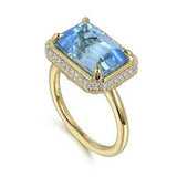 Lady's Yellow 14 Karat Horizontal Halo Fashion Ring Size 6.5 With One 5.56Ct Emerald Blue Topaz And 0.20Tw Round H/I Si2 Diamonds