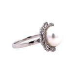 Lady's White 14 Karat Floral Halo Ring With One Cultured Pearl And 0.19Tw Round G/H Si1 Diamonds