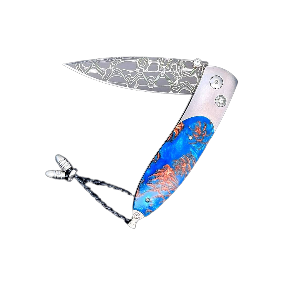 The Monarch ‘Blue Grove' William Henry Knife with Aerospace Grade Titanium with Mini Pine Cones Set in Resin and 'Intrepid' Damascus Steel Blade.