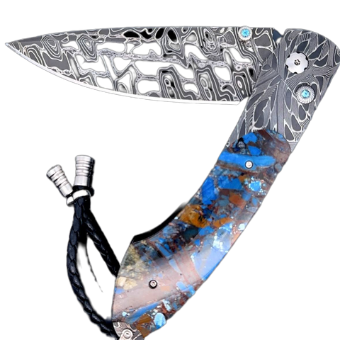 William Henry Knife B12 Blue Fusion, William Henry Knife The Spearpoint 'Blue Fusion' features a beautiful frame in hand forged 'X-Out' damascus by Chad Nichols. The handle is inlaid with a mesmerizing scale of 'Mammoth Fusion'. The blade is hand-forged '