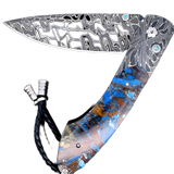 William Henry Knife B12 Blue Fusion, William Henry Knife The Spearpoint 'Blue Fusion' features a beautiful frame in hand forged 'X-Out' damascus by Chad Nichols. The handle is inlaid with a mesmerizing scale of 'Mammoth Fusion'. The blade is hand-forged '