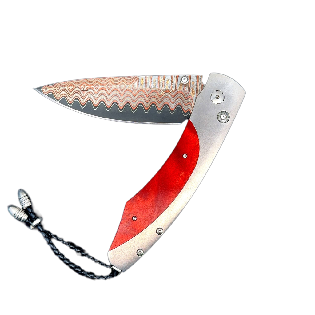 The Spearpoint ‘Poplar II' William Henry Knife with Aerospace Grade Titanium and Red Poplar Burl Inlay and 'Copper Wave' Damascus Steel Blade.