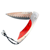The Spearpoint ‘Poplar II' William Henry Knife with Aerospace Grade Titanium and Red Poplar Burl Inlay and 'Copper Wave' Damascus Steel Blade.