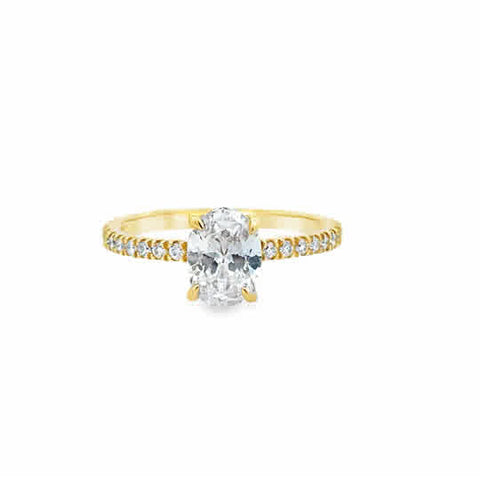 14 Karat Yellow Gold Engagement Ring Set with One Radiant Cubic Zirconium and .33ctw Round Brilliant Cut Diamonds.