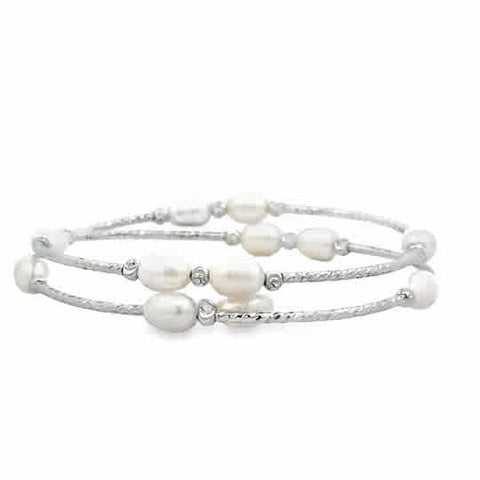 Made by 5.5mm freshwater cultured white rice pearls with open end. All pearls are very good luster and flawless. The length is flexible and fits everyone. It is dressy, light and comfortable to wear.