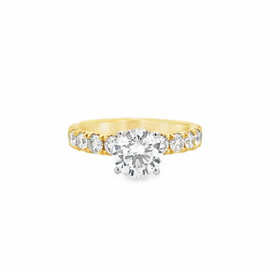 14 Karat Yellow Gold Engagement  Ring with 7.5mm Round Cubic Zirconium, and .95ctw Round Brilliant Cut Diamonds