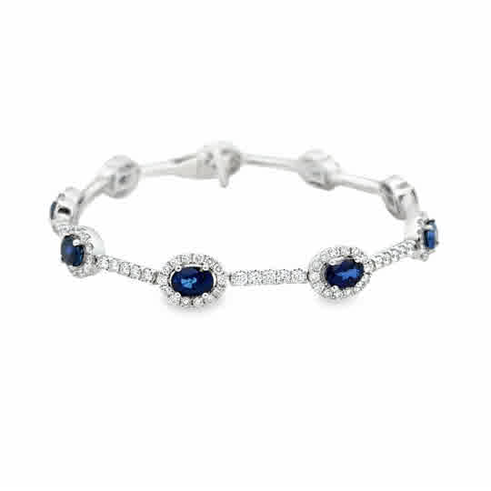 18 Karat White Gold, Oval Link Bracelet, Set With 5.27ctw Sapphires, and 3.12ctw Round Brilliant Cut Diamonds
