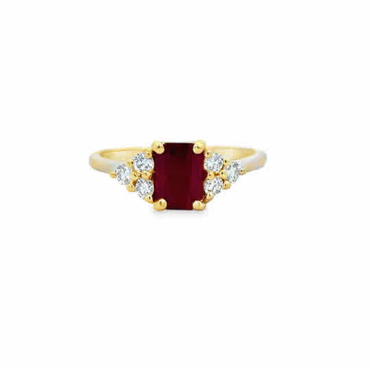 14 Karat Yellow Gold Fashion Ring with an Emerald Cut Ruby, and Round Brilliant Cut Diamonds