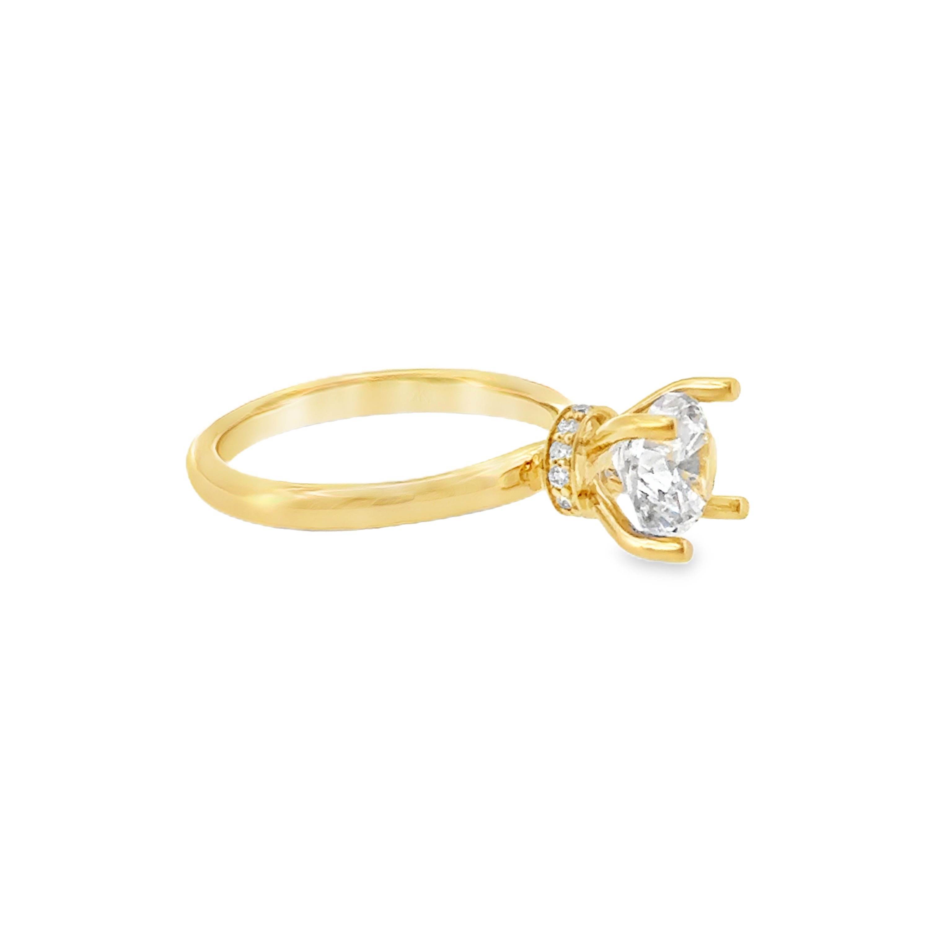 14 Karat Yellow Gold Solitaire with Round Cubic Zirconium And .09ctw Round Brilliant Cut Diamonds